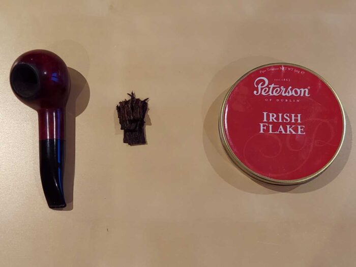 Stevens Method of Packing Flake Pipe Tobacco: now fold the flake lengthwise or vertically but only two-thirds of the way down.
